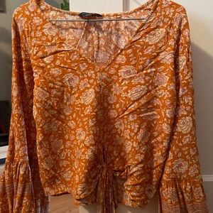 womens orange floral -neck blouse with front bottom tie from american eagle.